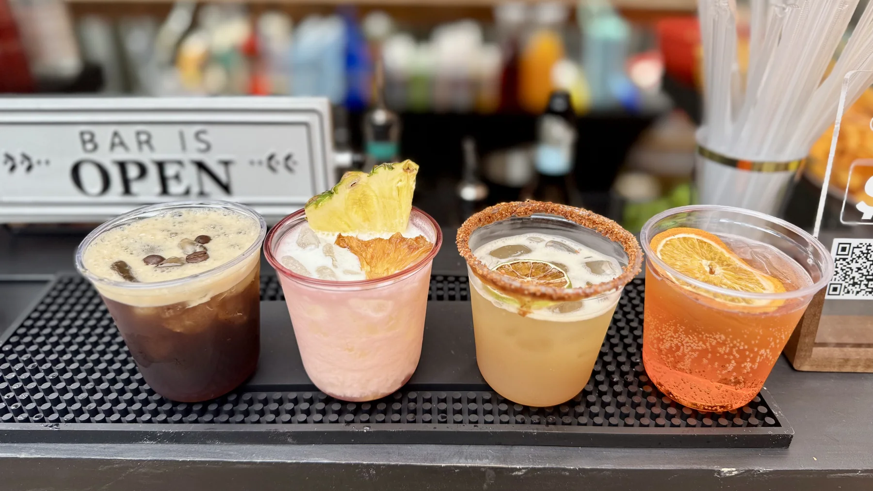 Four colourful cocktails prepared for a Toronto event
